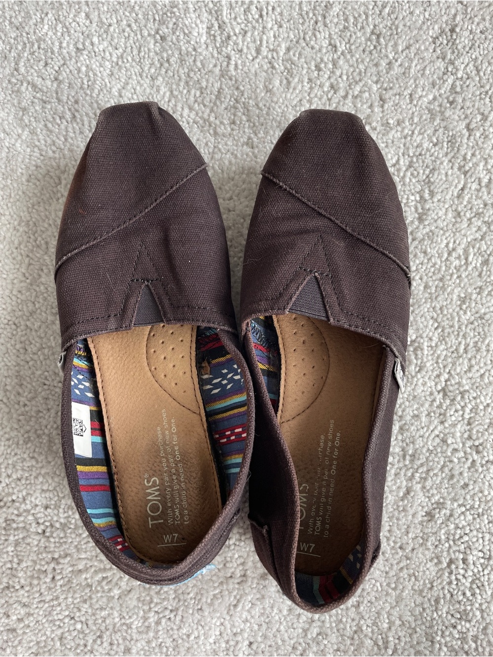 TOMS Classic Canvas Slip-Ons in Black